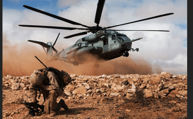 | US Marines wait to be extracted by helicopter during a military exercise in Cap Draa Morocco April 16 2012 Photo courtesy Defense ImageryWikimedia Commons | MR Online